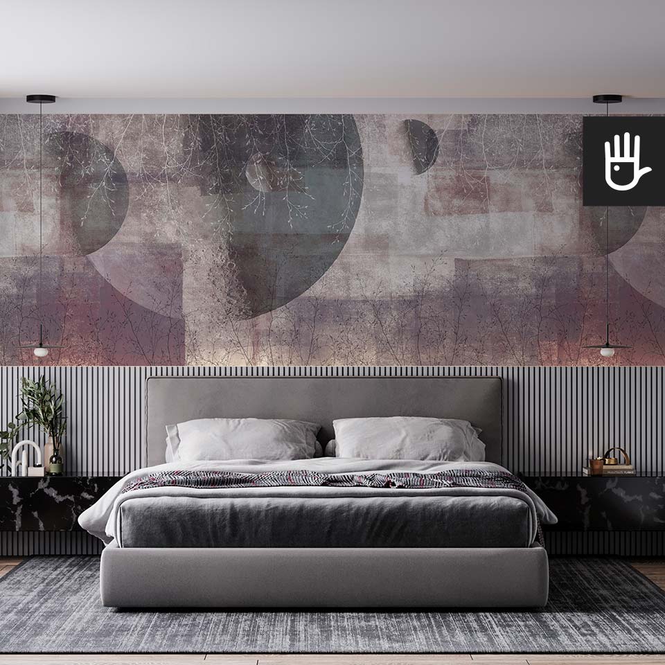 Fototapeta Czerwony księżyc na ścianie za szarym łóżkiem kontynentalnym, nad lamperią z szarych lameli, w sypialni w stylu modern.