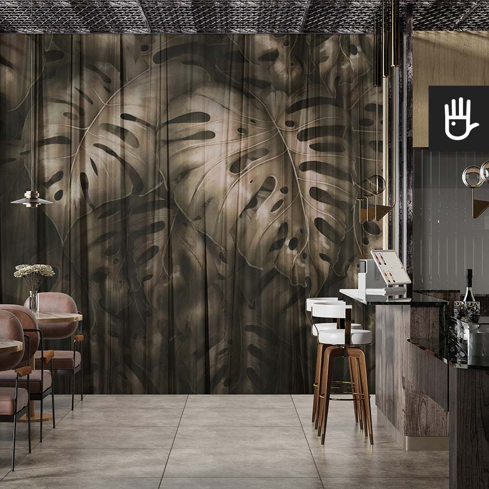 Loftowe wnętrze kawiarni z barem z elegancką tapetą ścienną z motywem ogromnych tropikalnych liści w kolorze starego złota pod nazwą fototapeta złota monstera