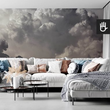 wnętrze salonu w stylu boho z kanapą z kolorowymi poduszkami na tle tapety ściennej z chmurami Fototapeta Kłębiaste chmury