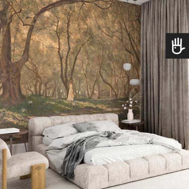 Przytulna sypialnia w stylu boho z dużym łóżkiem obitym materiałem na tle fototapety z lasem