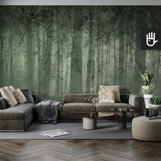 Nowoczesny salon w szarej tonacji z tapetą z gałęziami i widokiem lasu o fakturze betonu i kolorze butelkowej zieleni
